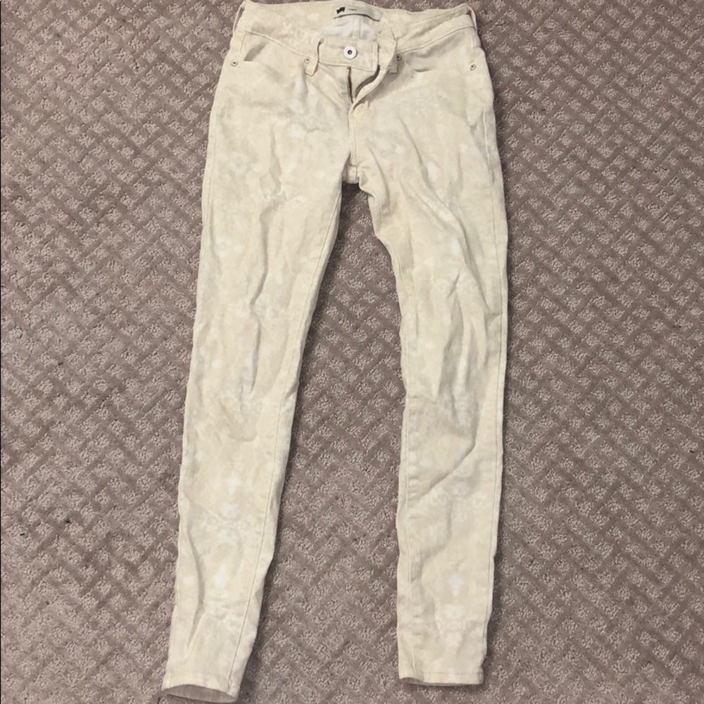 Snake print skinny jeans